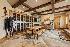 Beamed ceiling with recessed lighting