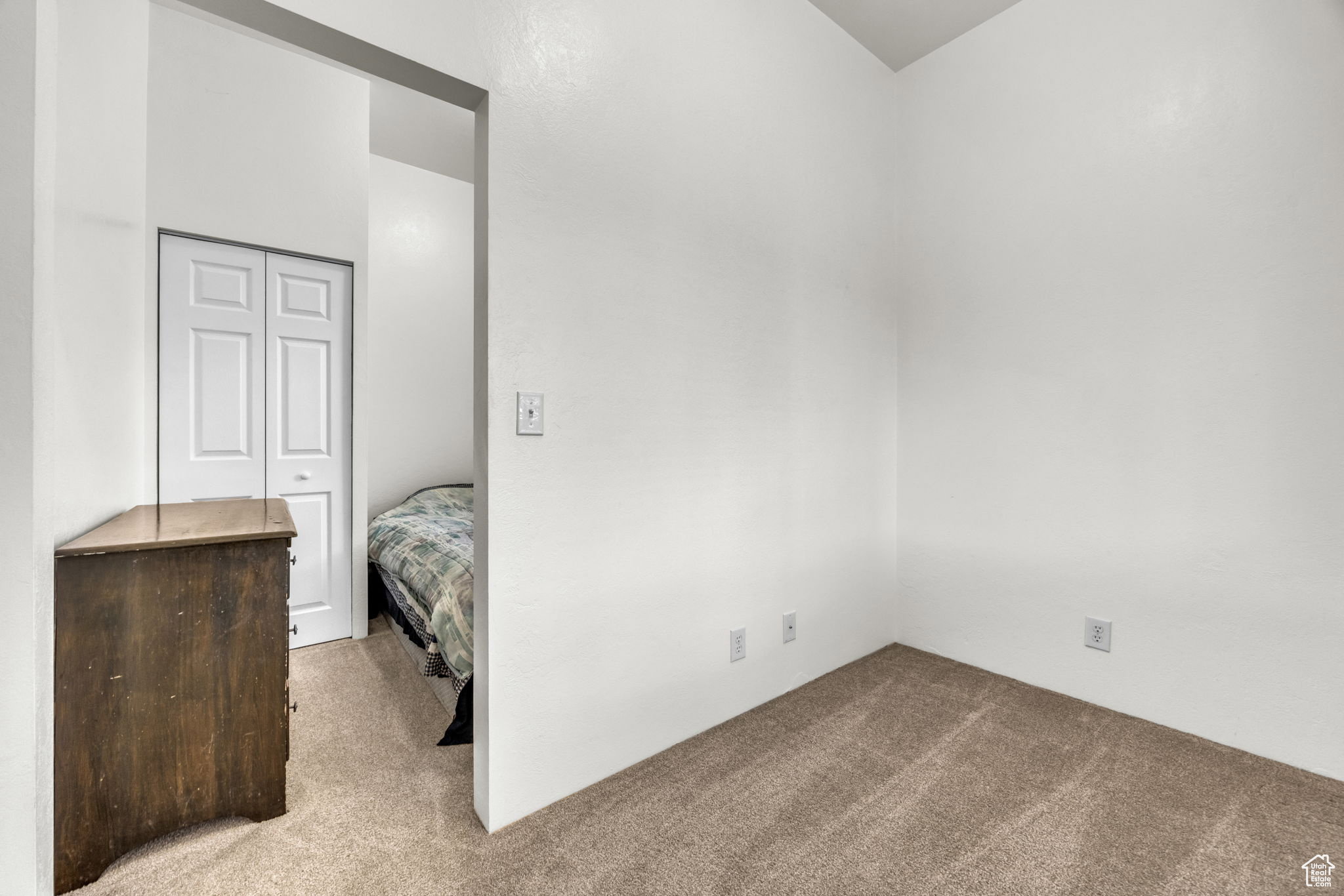 Neutral-toned carpeting throughout