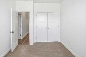 Neutral-toned carpeting paired with crisp white walls