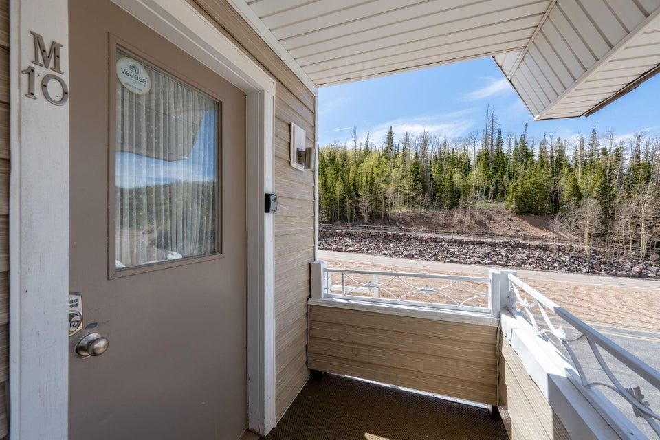 Entry door with integrated window and numerical designation M10
