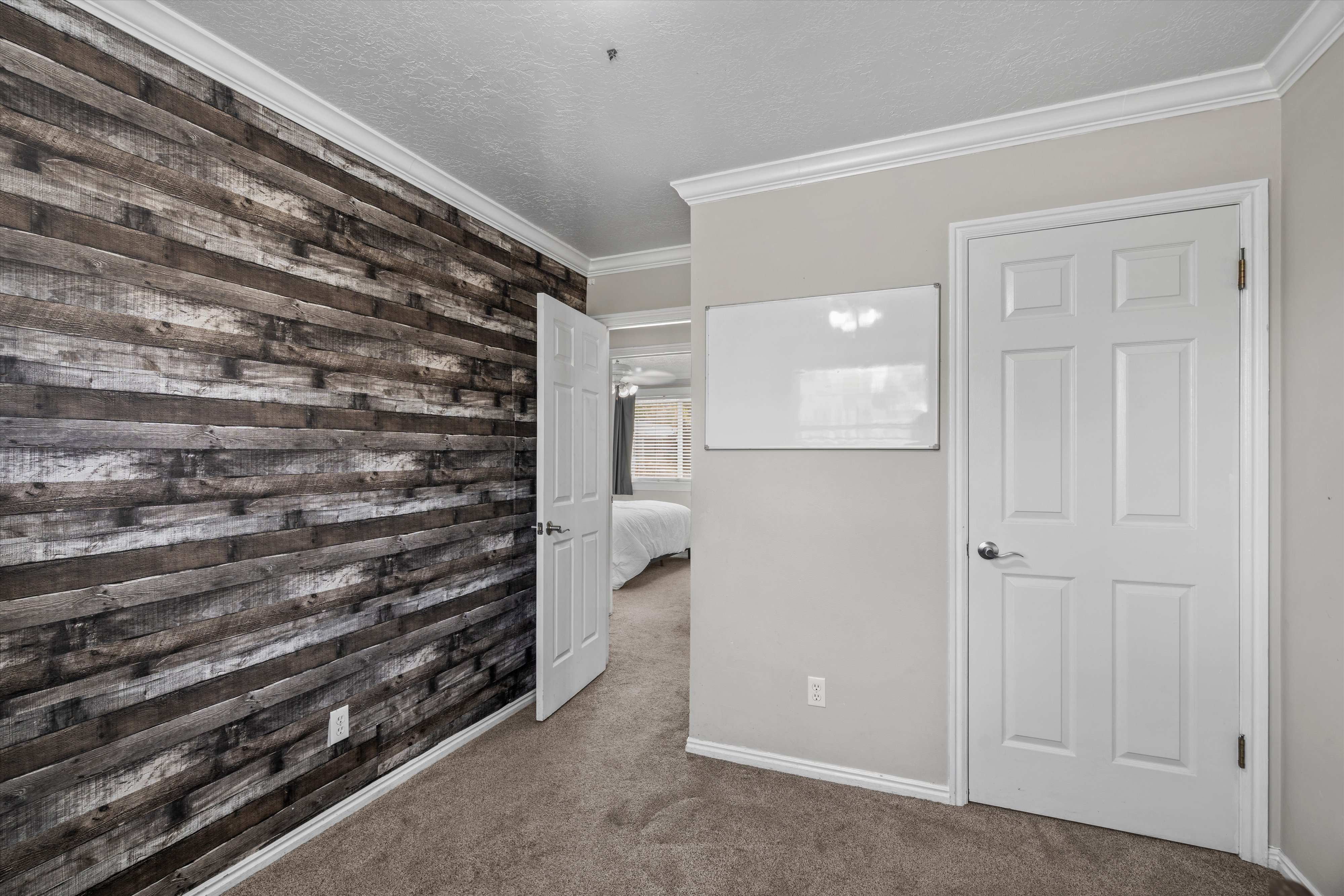 Accent wall featuring horizontal wood paneling