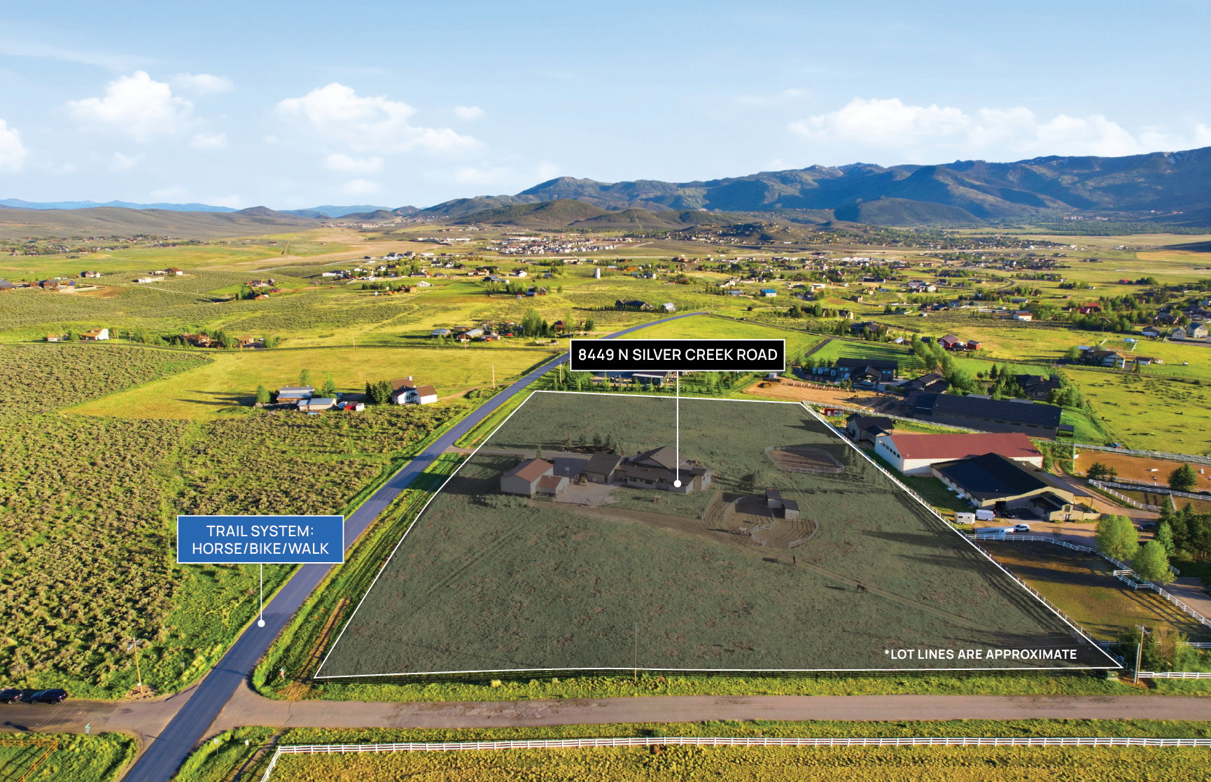 Expansive parcel featuring a main residence and multiple outbuildings