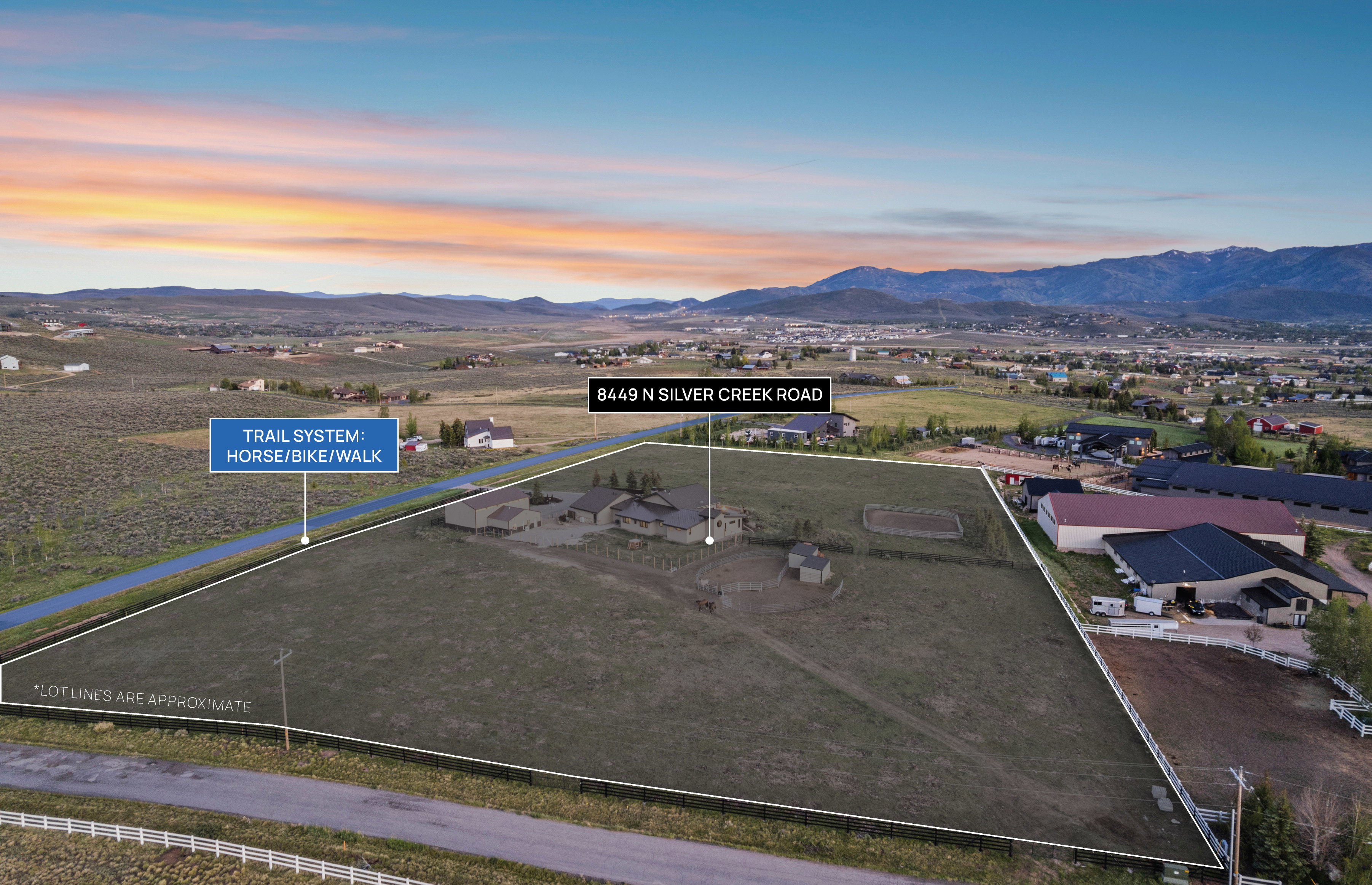 Expansive rural property featuring multiple structures and direct access to a horse, bike, and walk trail system