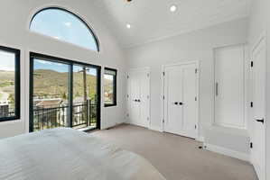 Vaulted ceiling with horizontal paneling and recessed lighting