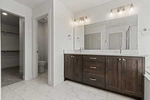 White tile flooring with subtle gray veining