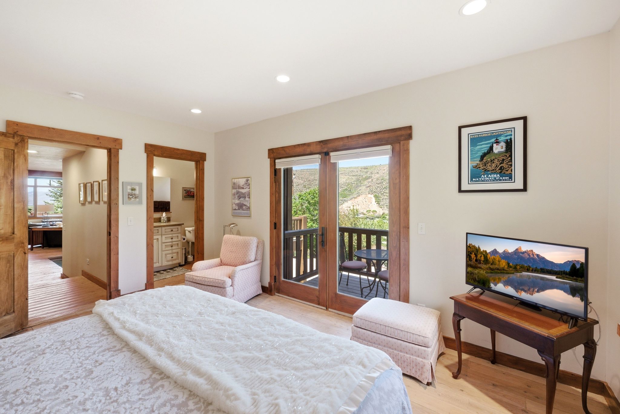 Interior room featuring wood-finish flooring and recessed lighting