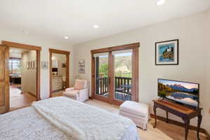 Interior room featuring wood-finish flooring and recessed lighting