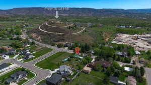 Aerial perspective showcasing the surrounding landscape with distant mountains