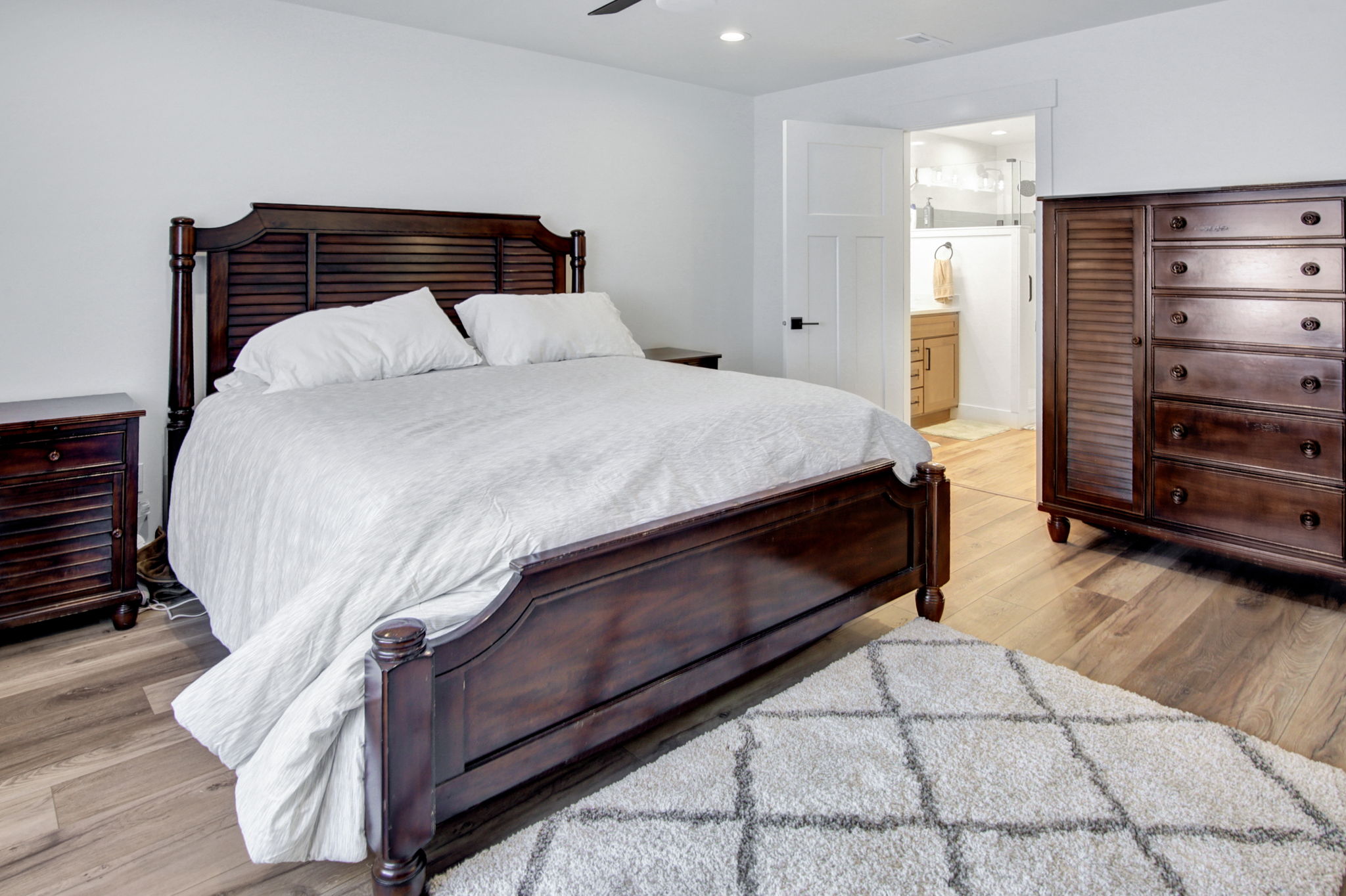 Bedroom featuring LVP flooring, recessed lighting, and a ceiling fan