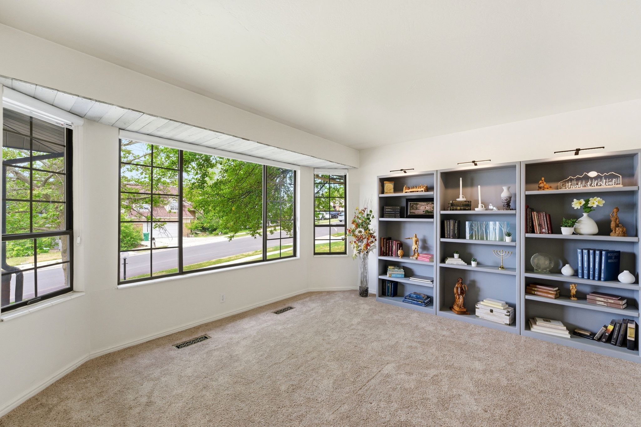 Expansive bay window featuring multiple panes and exterior views