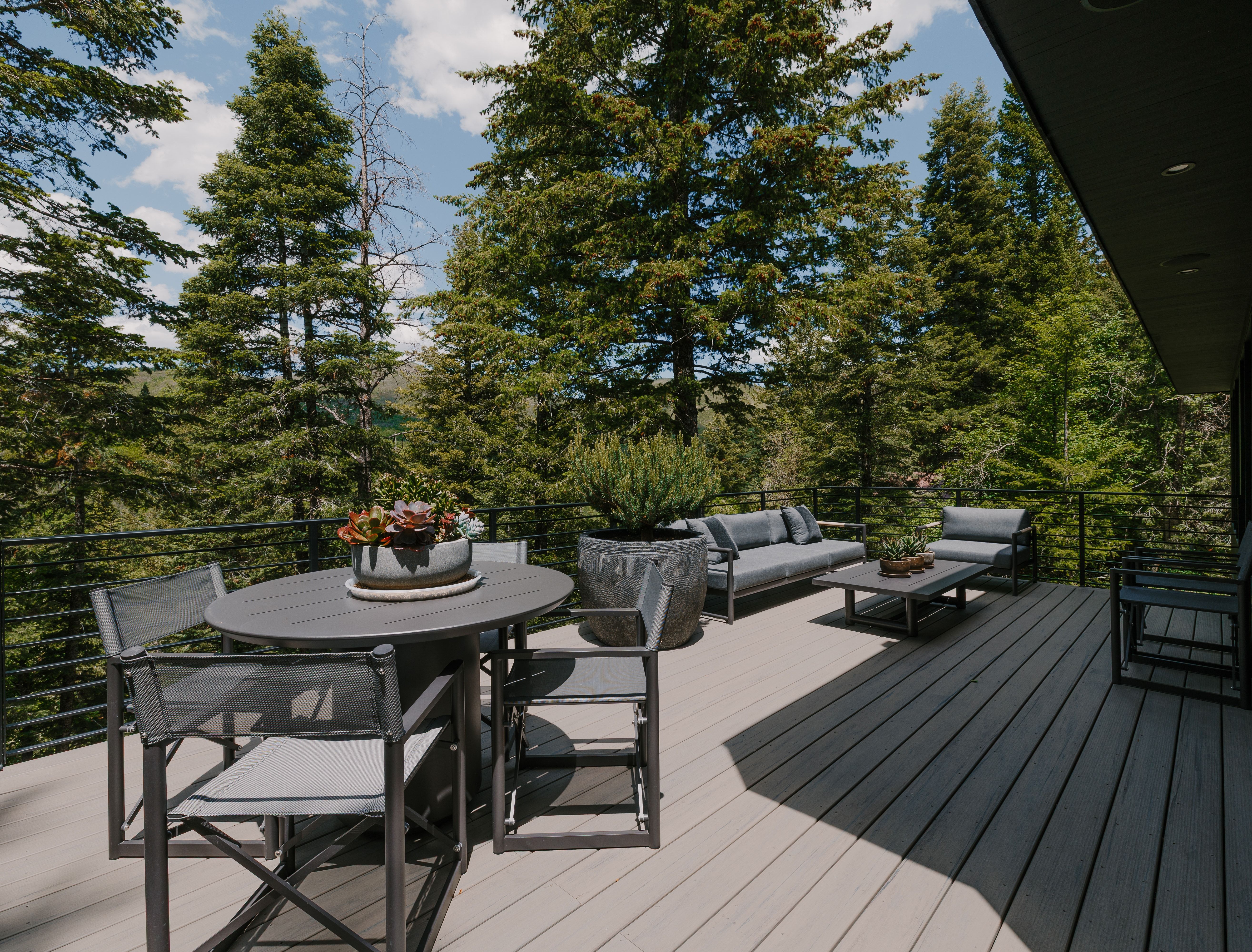 Spacious outdoor deck featuring light-toned composite decking