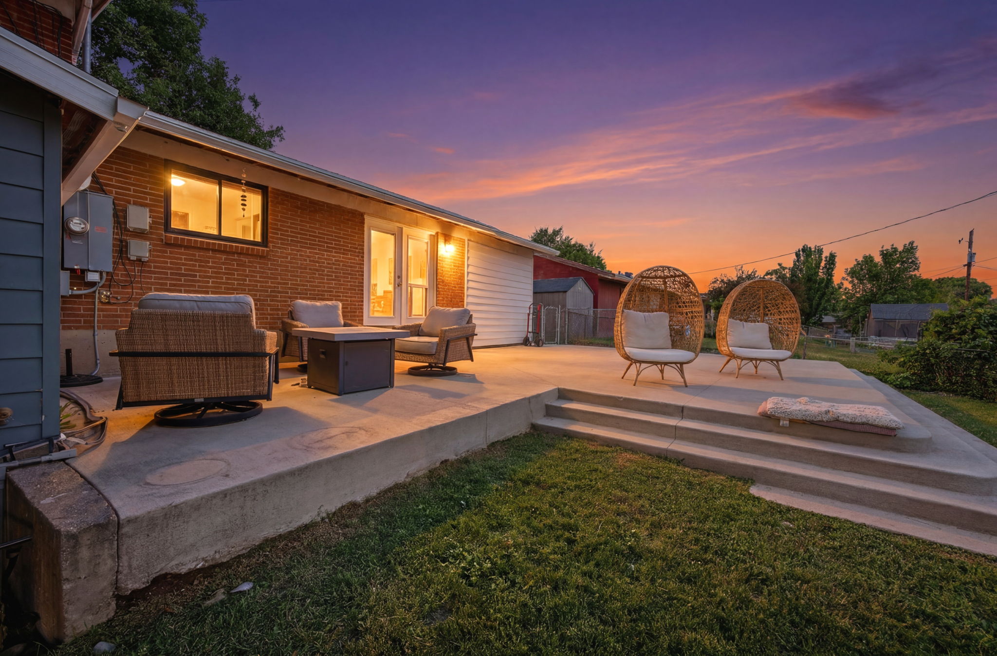 Expansive concrete patio featuring multiple levels and integrated steps