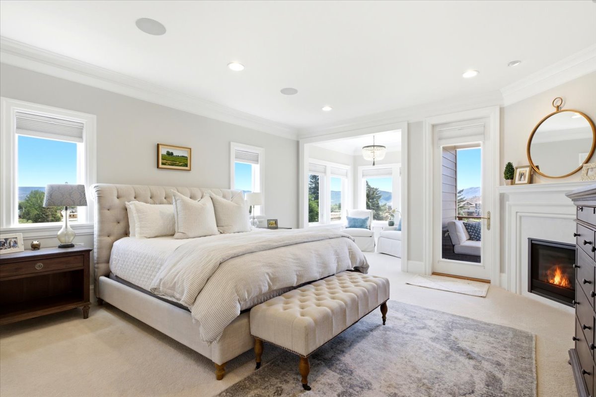 Master Bedroom Featuring a Fireplace
