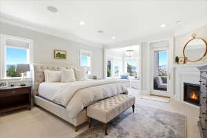 Master Bedroom Featuring a Fireplace