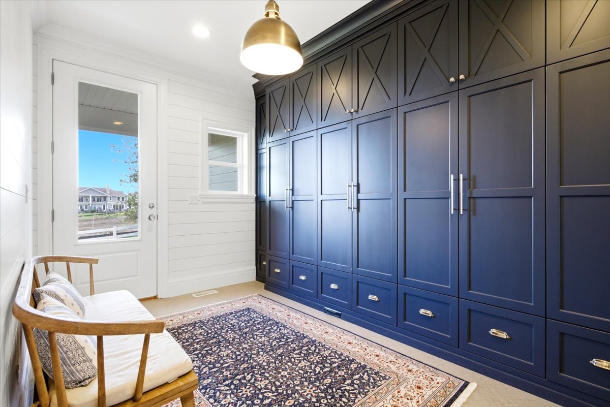Mud room featuring built-in cabinetry