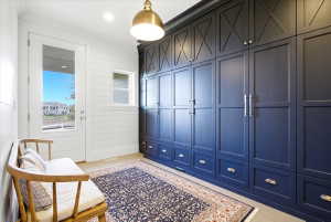 Mud room featuring built-in cabinetry