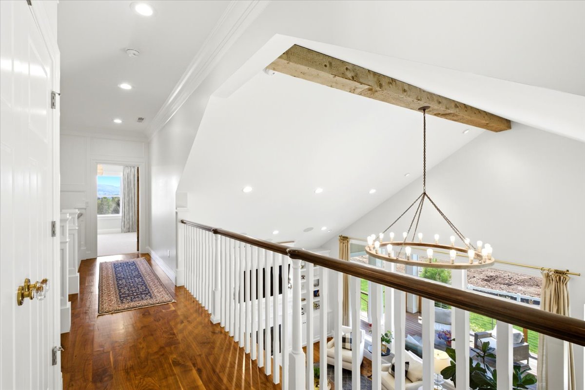 Level 2 hallway featuring an interior balcony