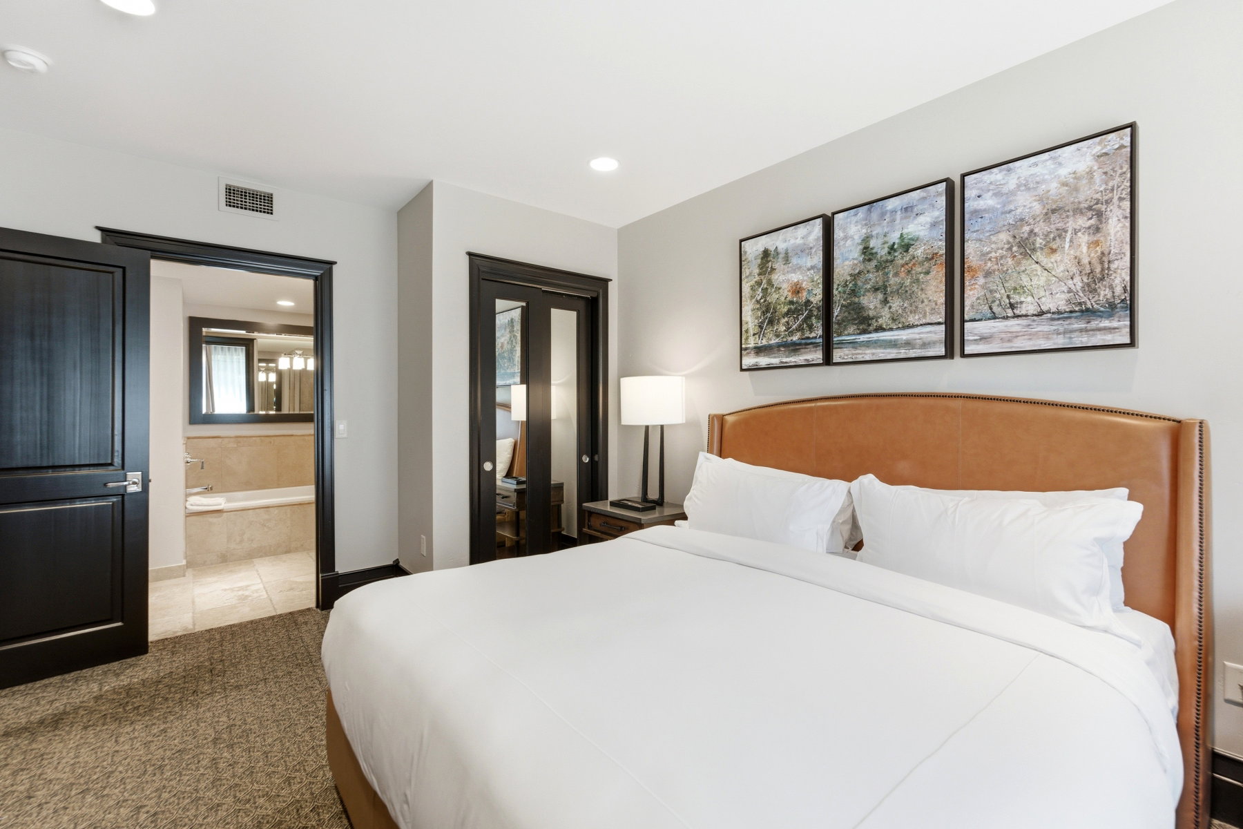 Bedroom featuring a light gray wall color, recessed lighting, and carpet flooring