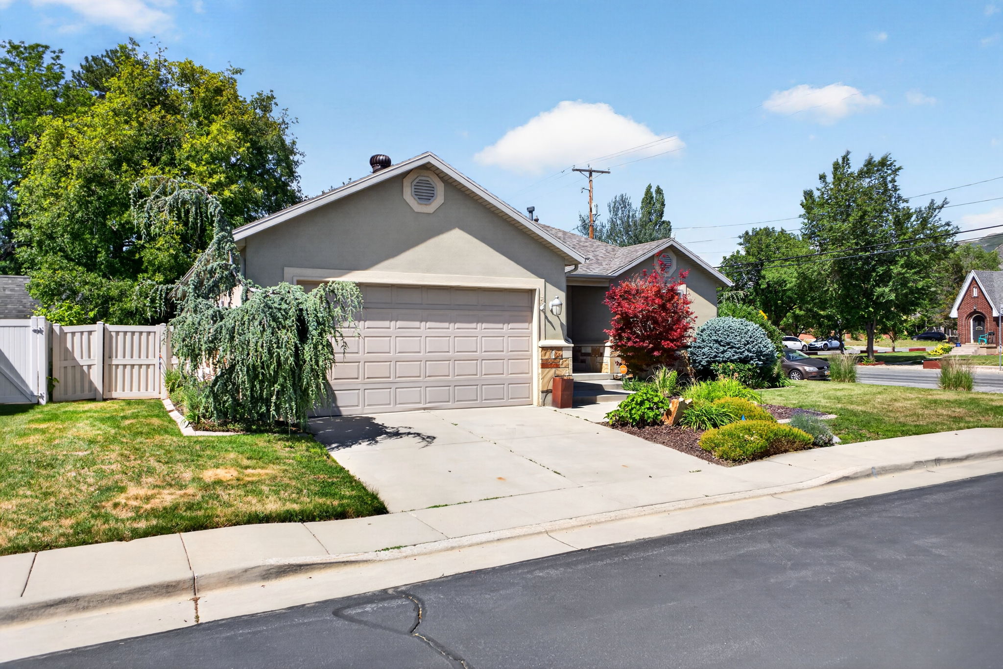 Single-story exterior with an attached two-car garage