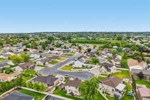 Residential neighborhood featuring a mix of single-family homes with varying architectural styles