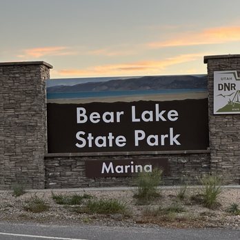 Stone veneer monument sign featuring "Bear Lake State Park Marina" lettering