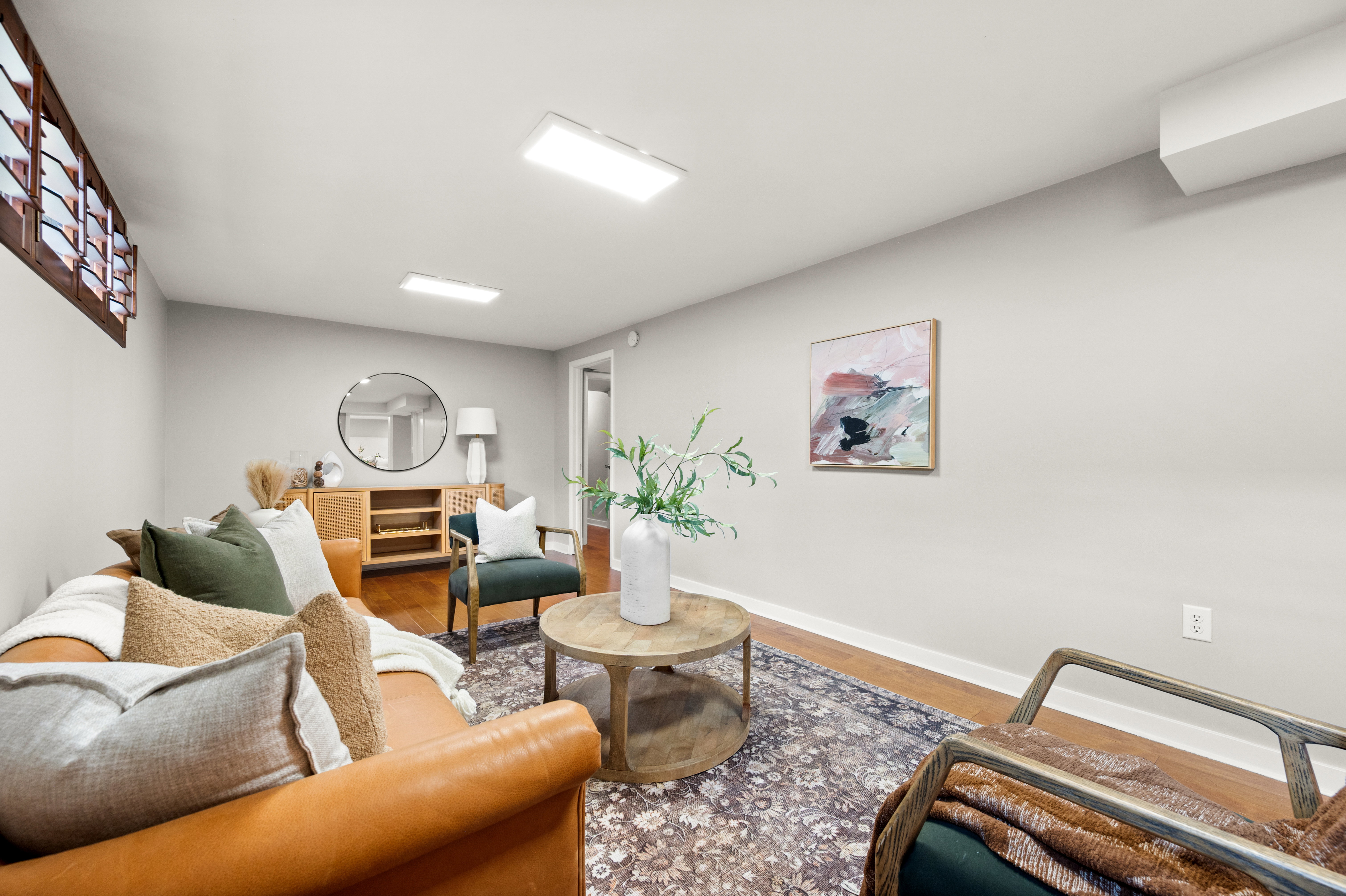 Hardwood-style flooring throughout this living space