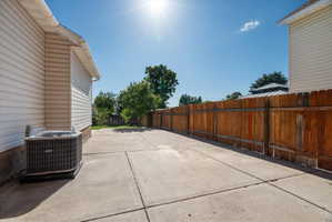 RV/Toy Area  Additional Parking Expansive concrete patio area with a privacy fence