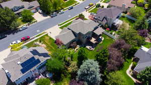 Spacious property featuring a multi-level deck, covered patio, and extensive landscaping