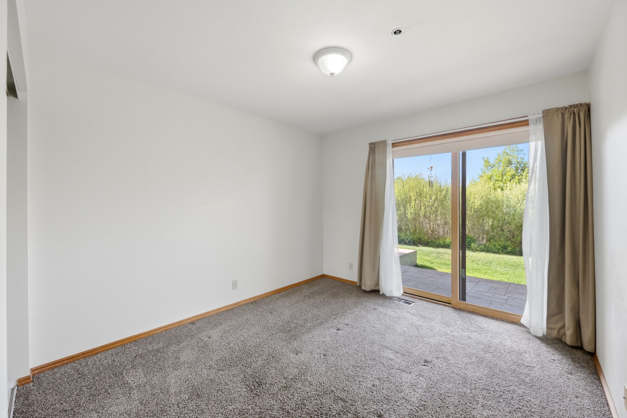 Bedroom With Sliding Class Doors