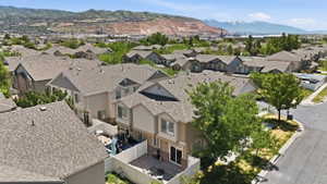 Townhome community featuring neutral-toned exteriors and asphalt shingle roofs