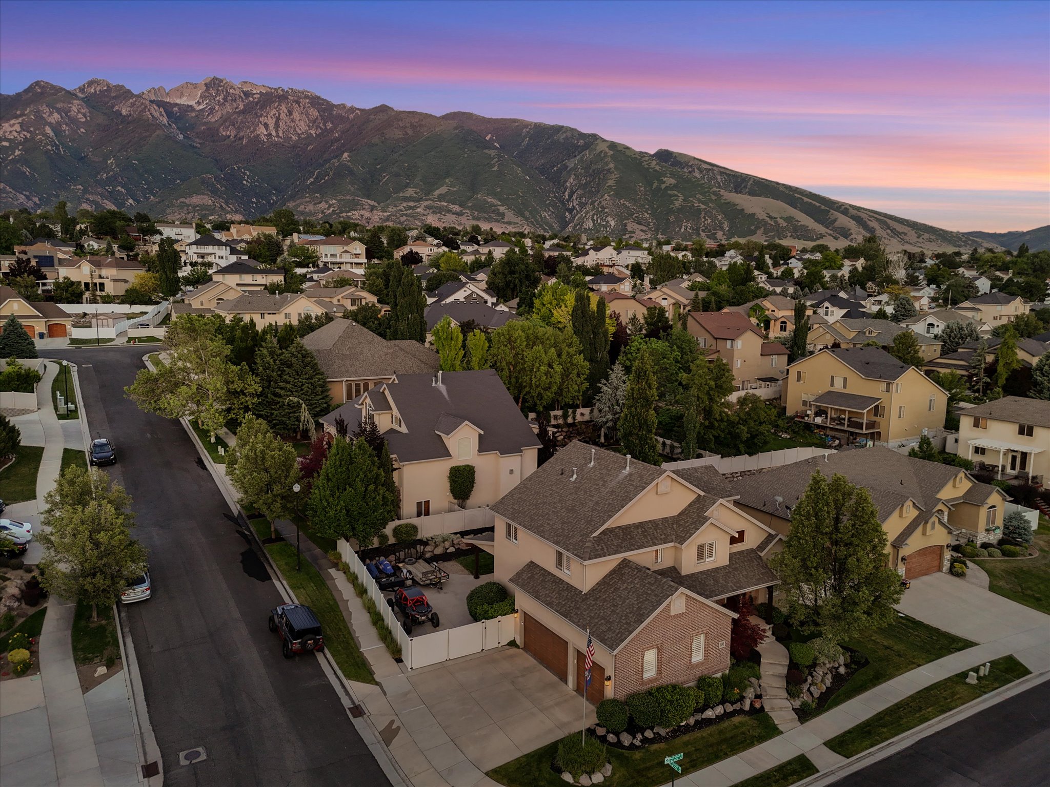 Residential neighborhood featuring a prominent mountain range backdrop