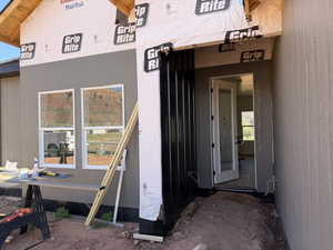 Entryway will feature black standing seam metal.