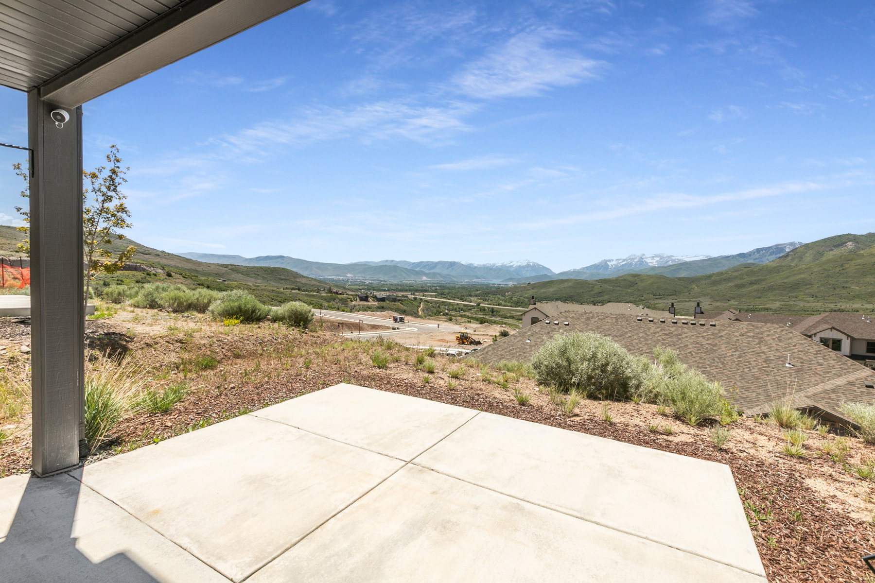 Covered patio featuring a concrete surface, providing an outdoor extension to the living space