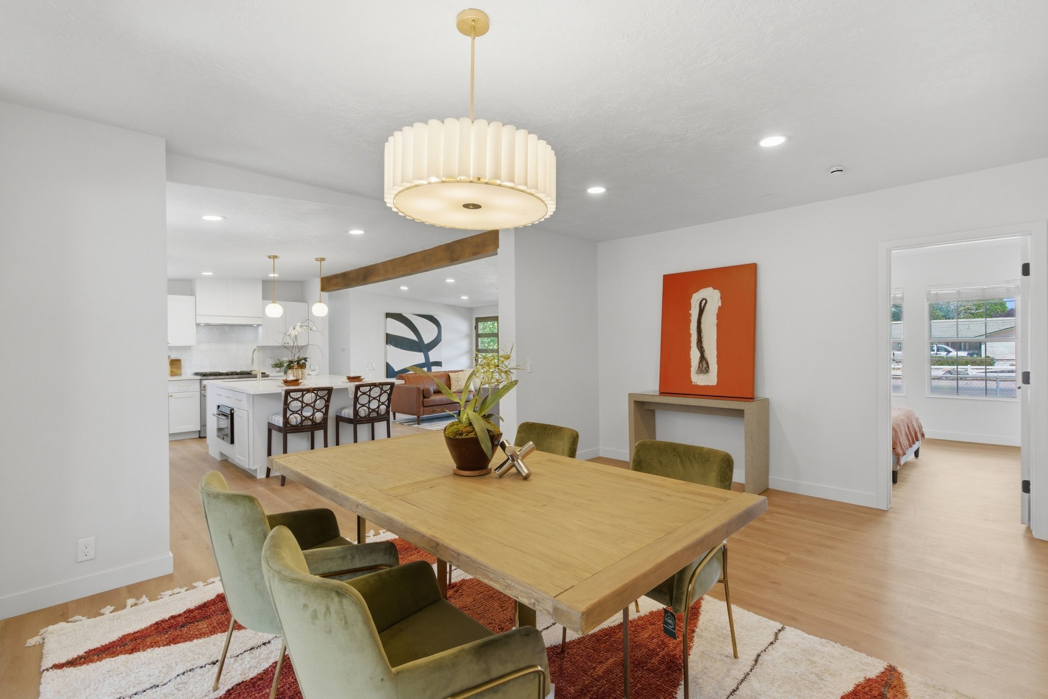 Spacious dining area featuring recessed lighting and wood-finish flooring