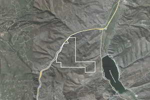 Aerial Map. Outlining the property boundaries relative to geographical features