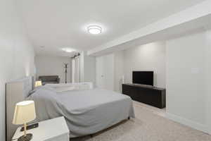 Carpeted room featuring recessed lighting and a white color palette