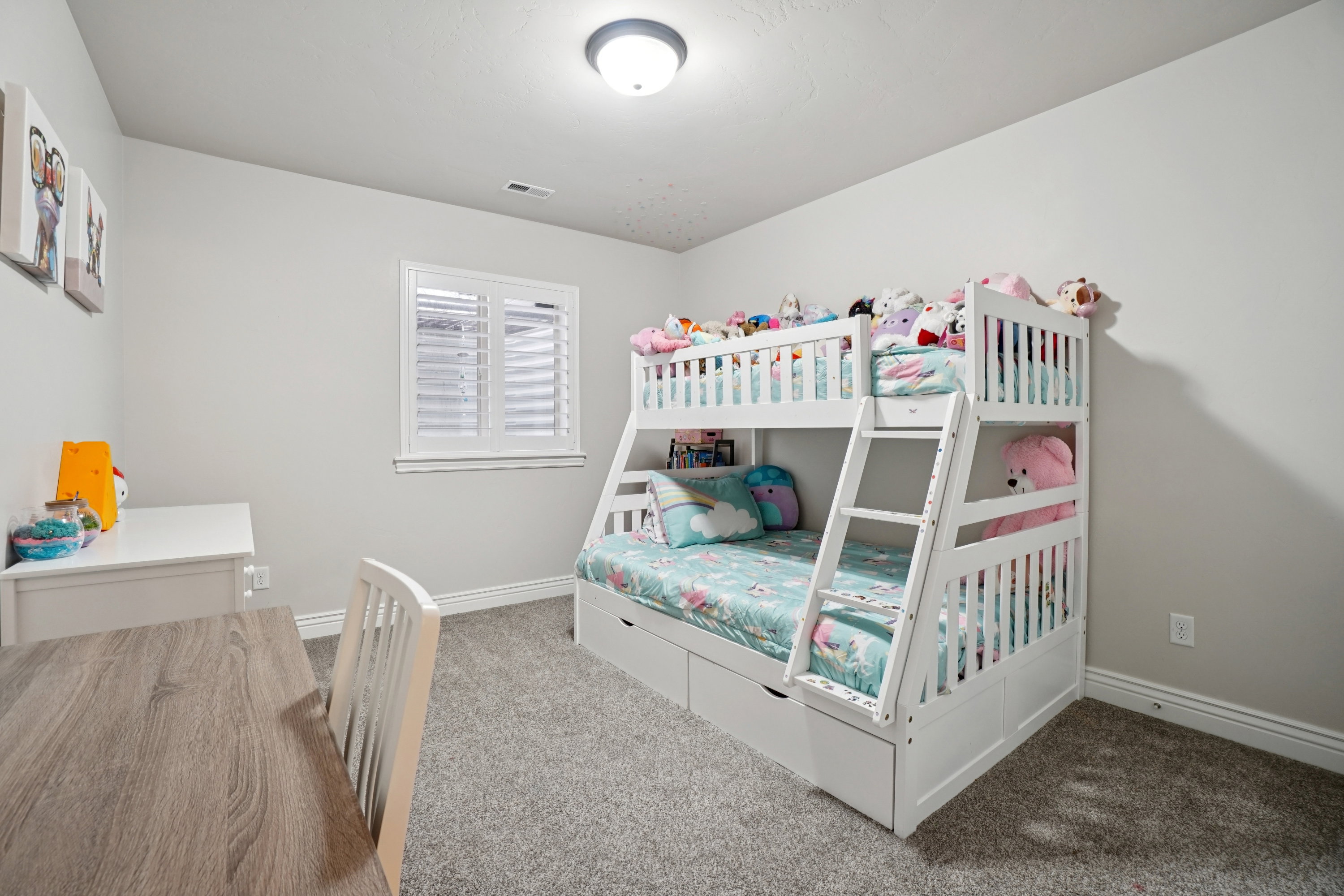 Room featuring light gray painted walls and matching gray carpeting