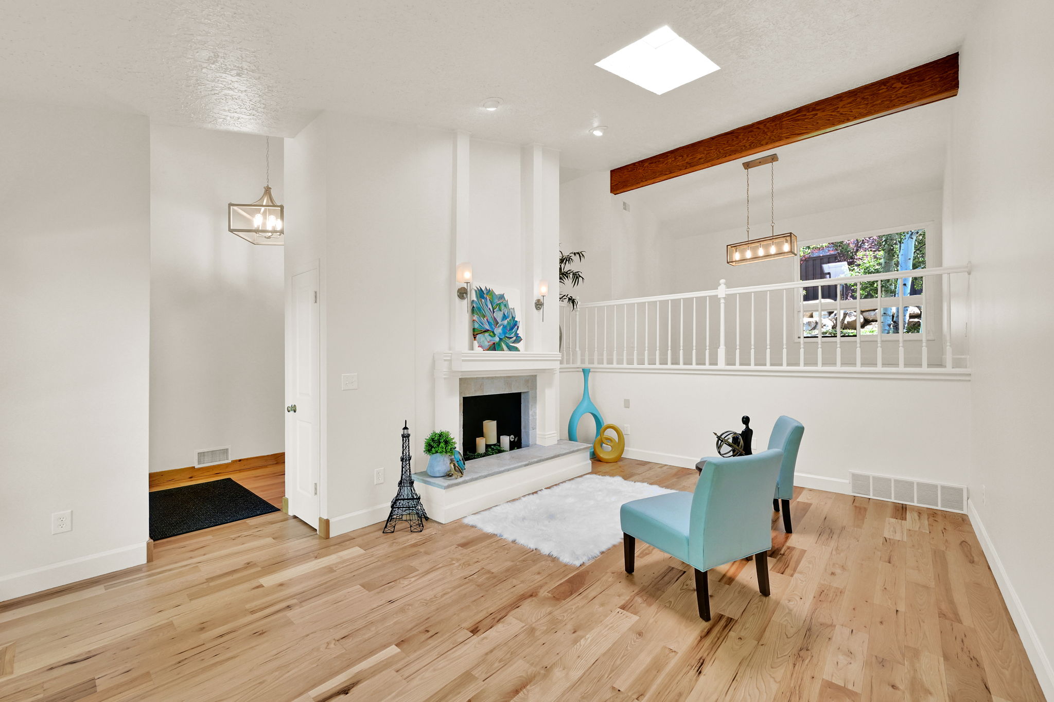 Bright interior space featuring light wood-finish flooring
