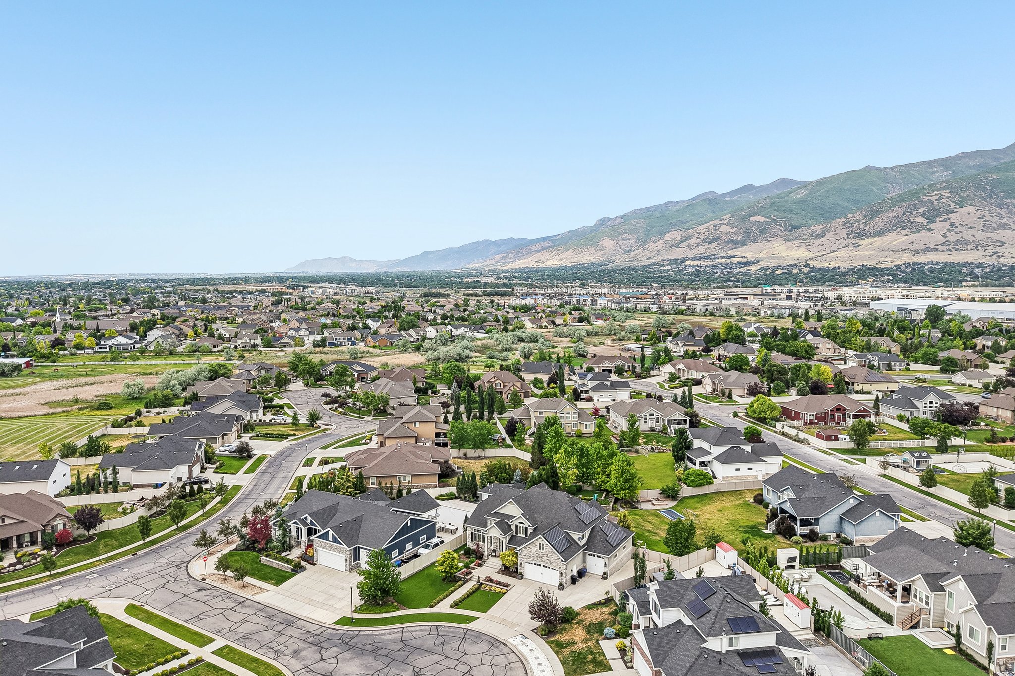 Aerial perspective showcasing a residential community with varied architectural styles