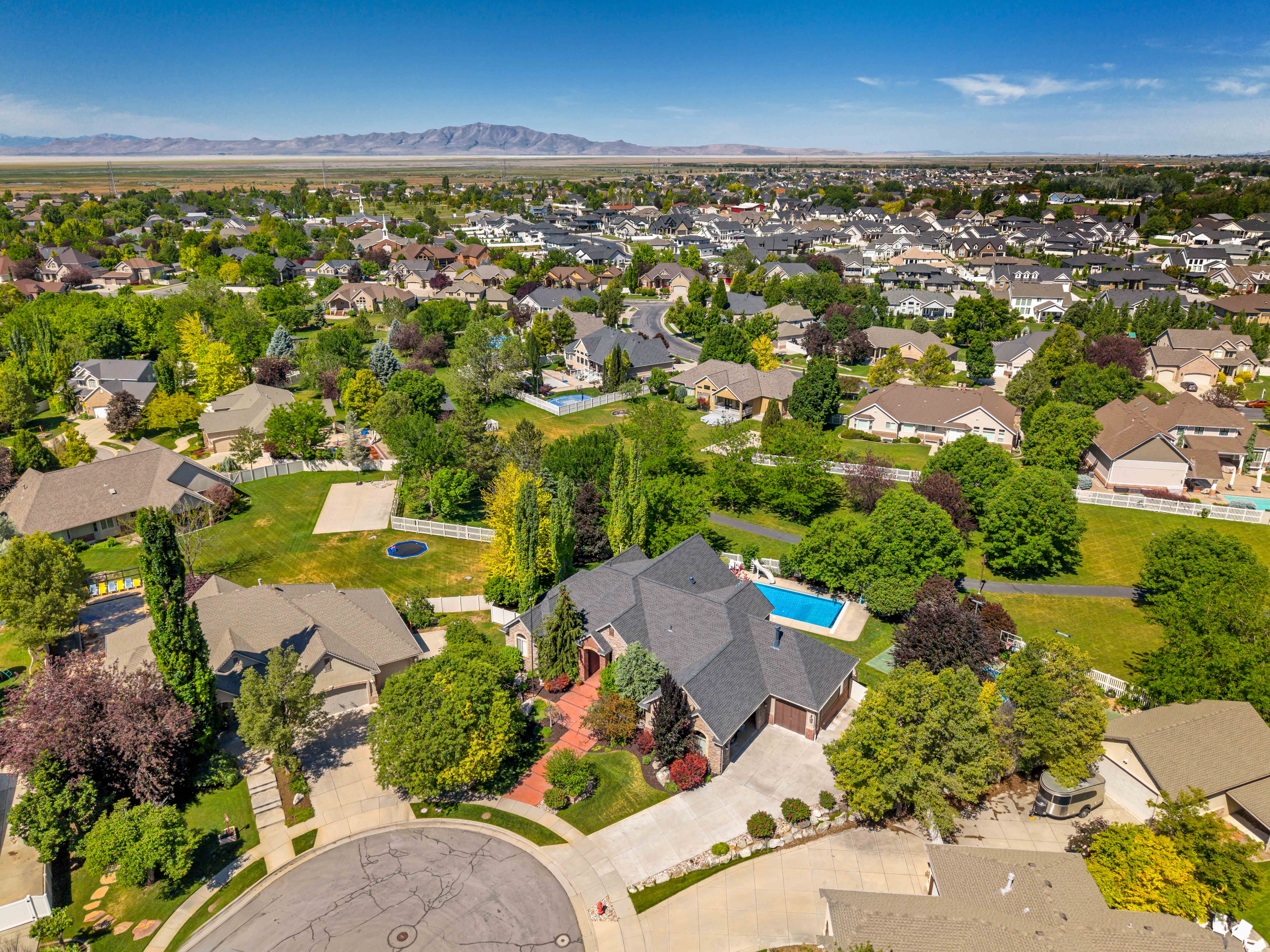 Aerial perspective showcasing a residential neighborhood with varied architectural styles