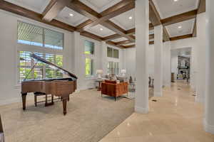 Vaulted ceiling with dark wood coffered beams