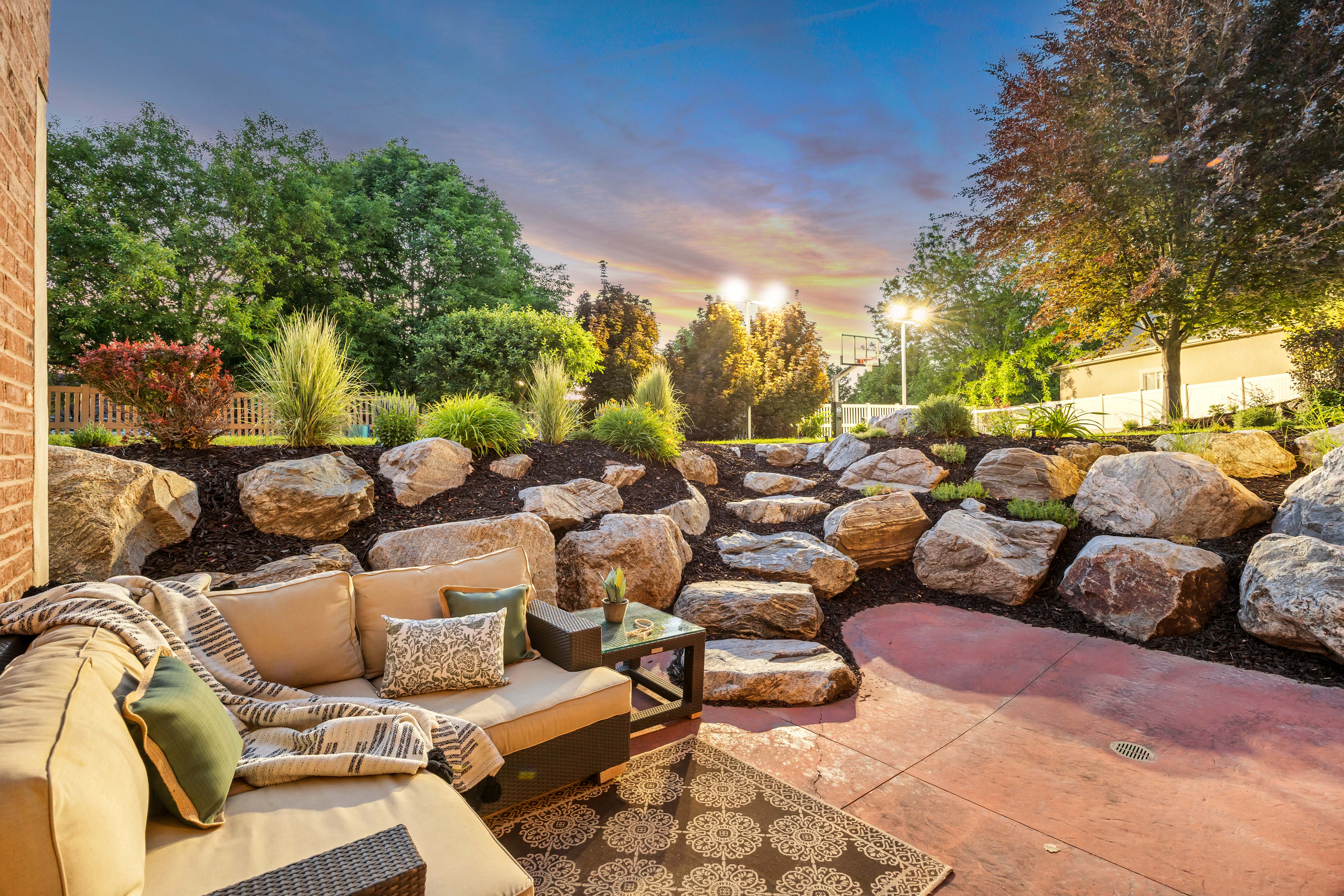 Expansive outdoor patio with a stained concrete surface