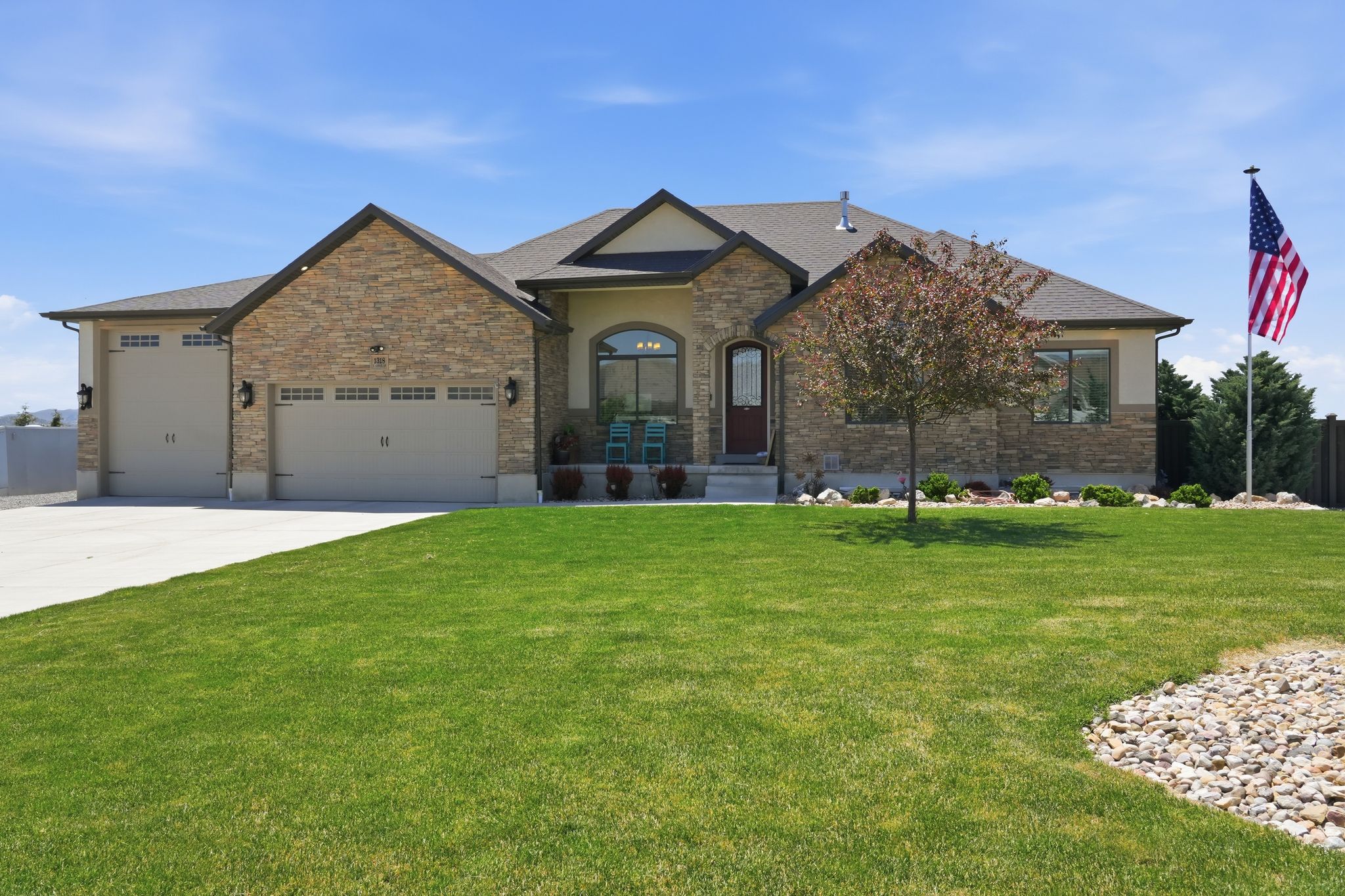 Stone-accented exterior with multiple gables