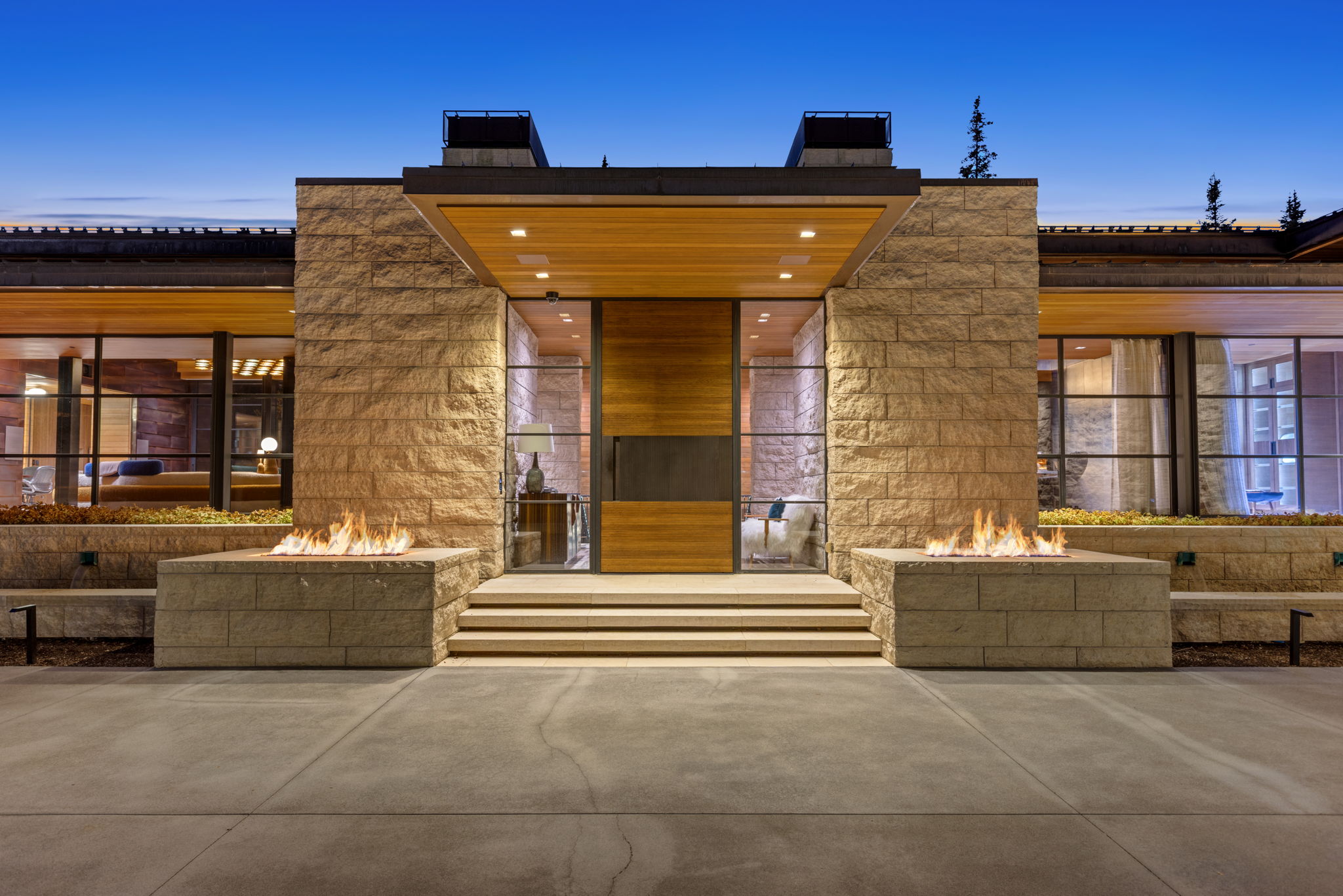 Modern architectural facade featuring stone block construction