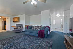 Spacious interior featuring wall-to-wall carpeting and white trim