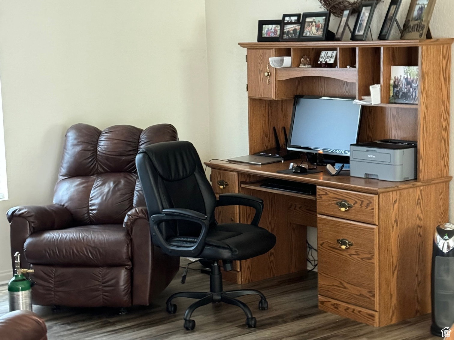 Light-toned walls with wood-finish flooring