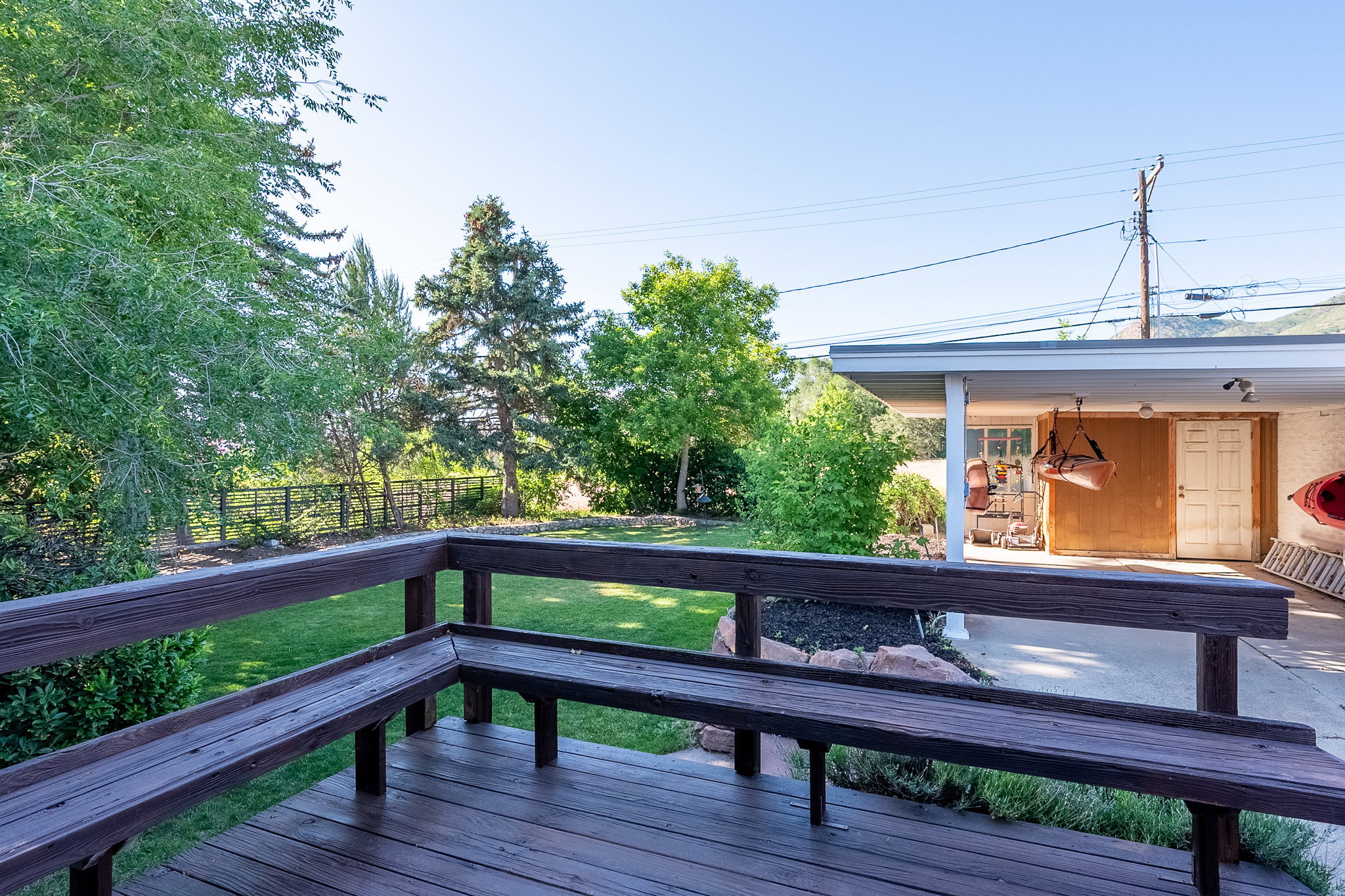 Redwood deck overlooking backyard