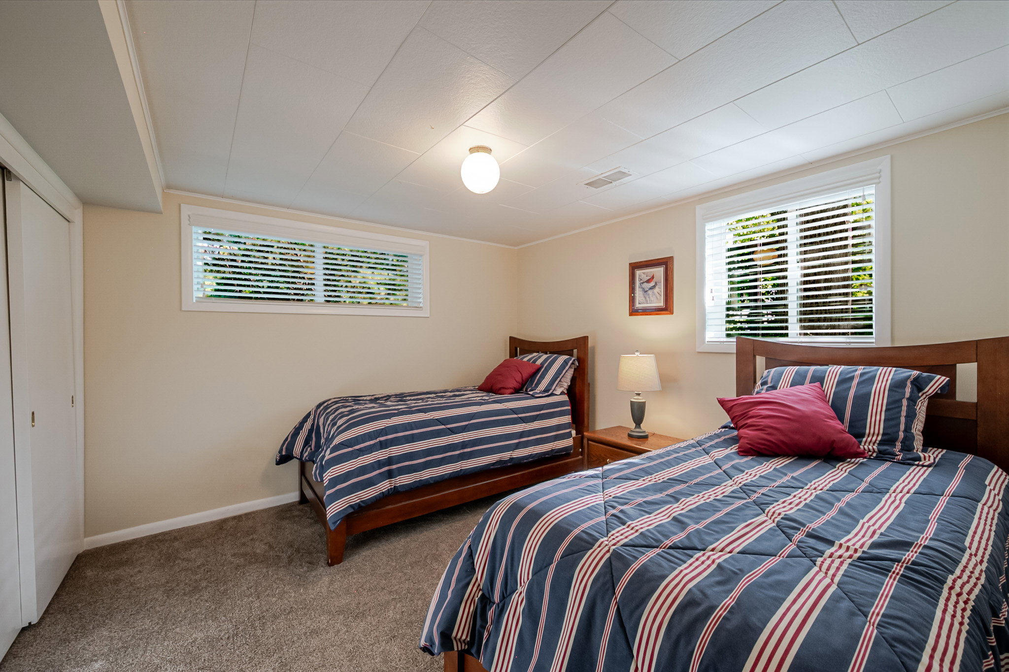 Bright bedroom with newer carpet