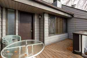 Private outdoor deck featuring wood-finish flooring