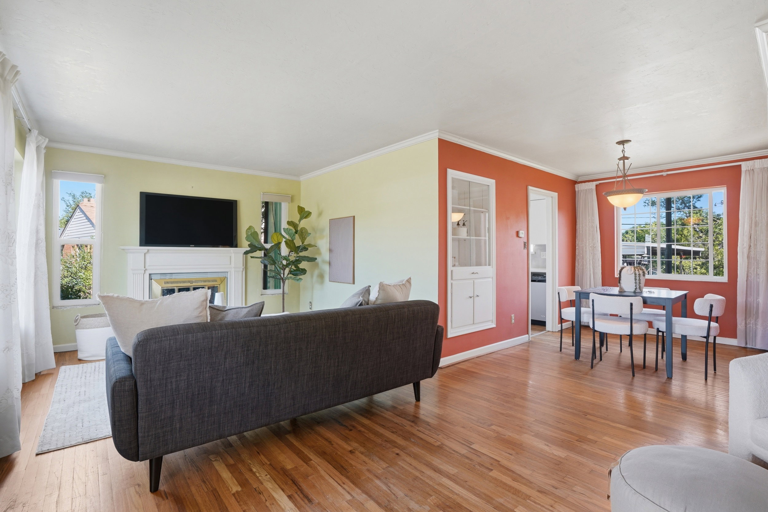 Hardwood flooring throughout the living and dining areas